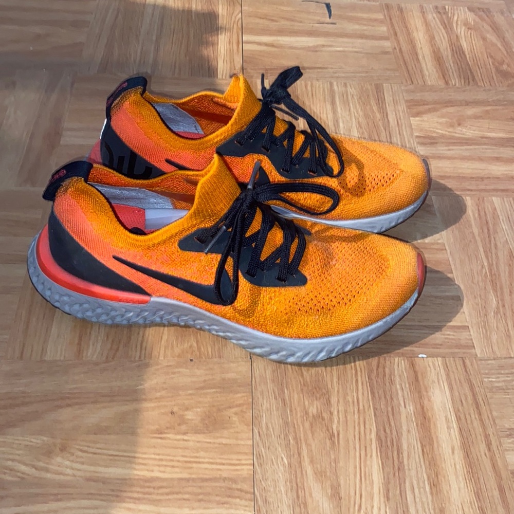 Orange and pink Nike epic react